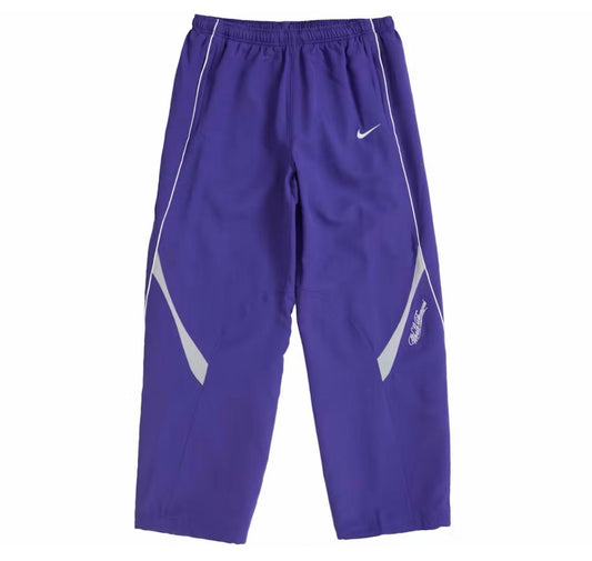 NIKE X SUPREME PURPLE TRACKPANTS